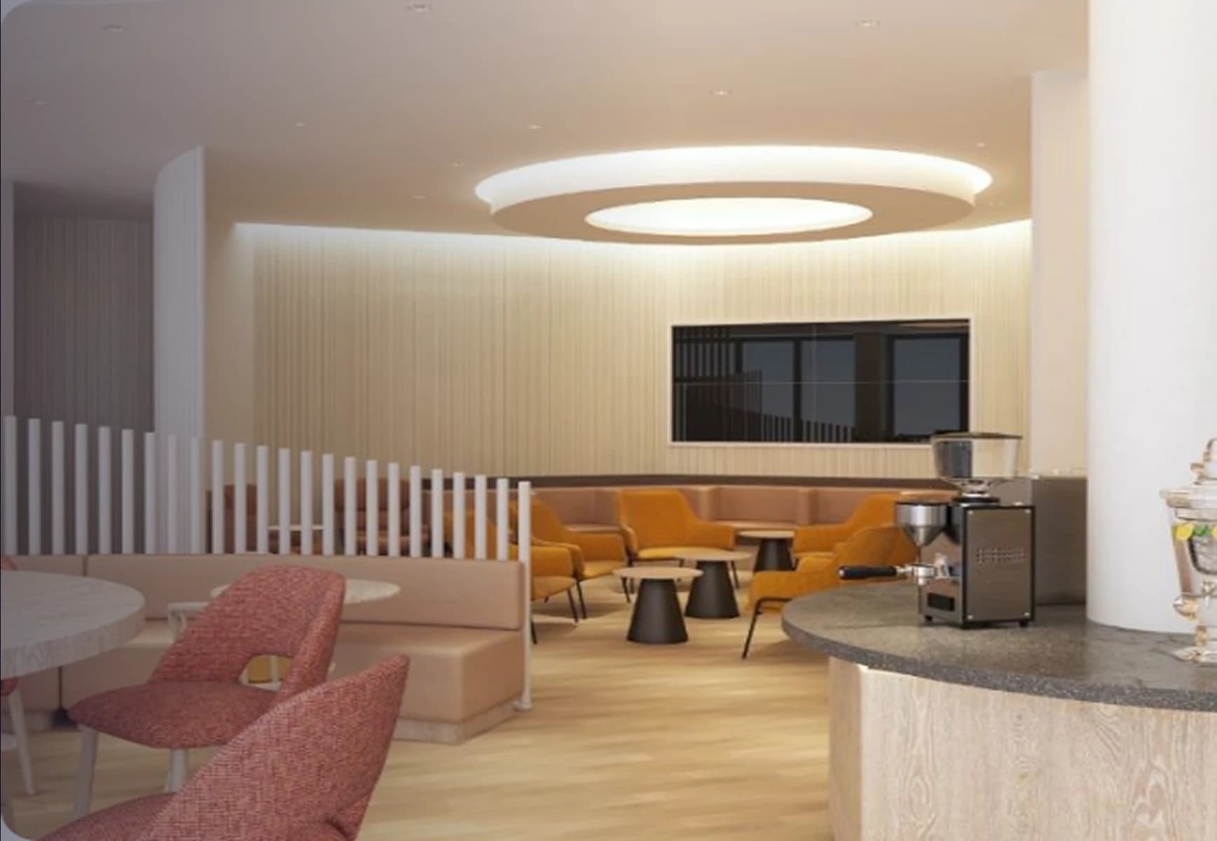 A budapesti Mastercard Airport Lounge váró fotelekkel és bárpulttal.